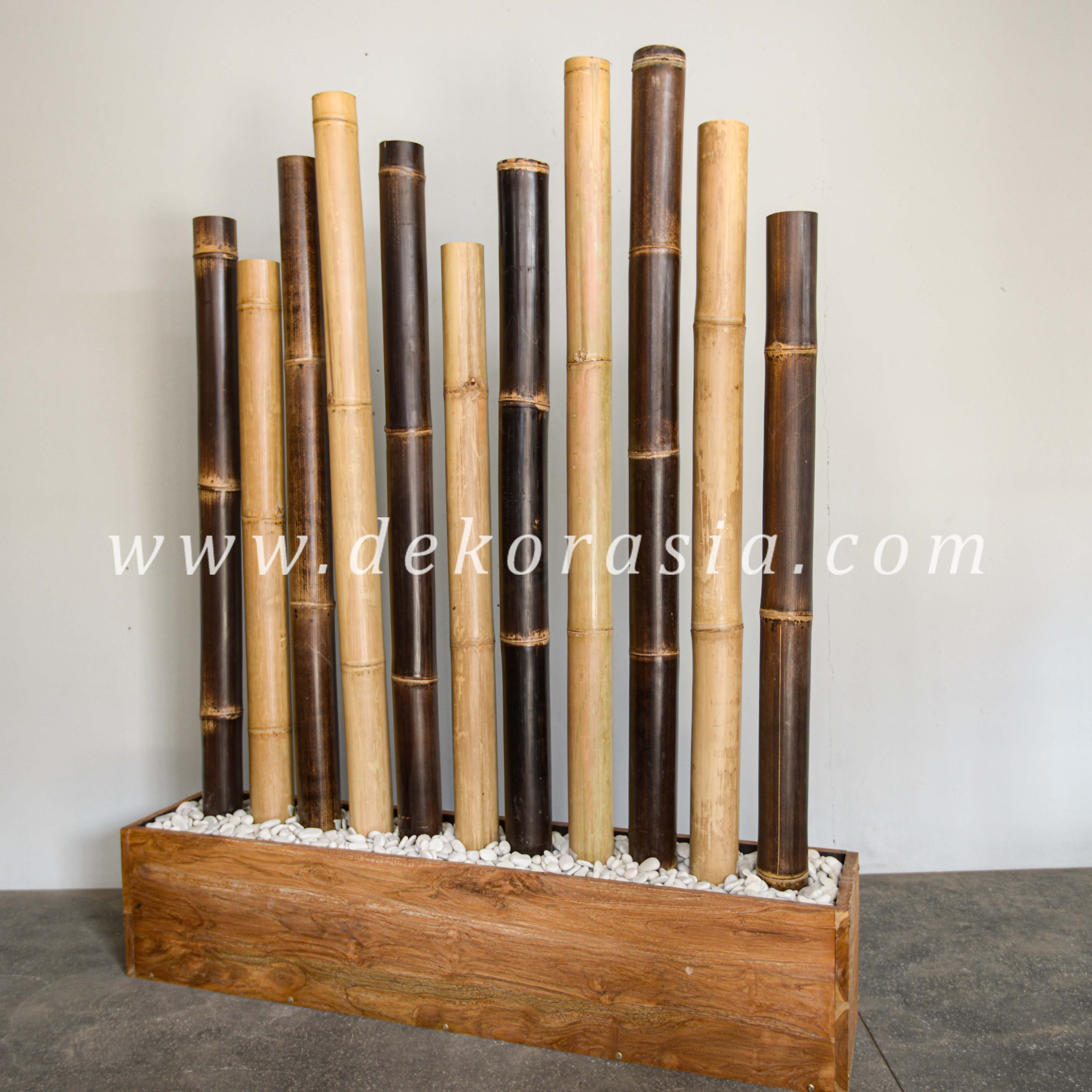Bamboo Poles On The Rectangle Rustic Teak Pot With Pebbles